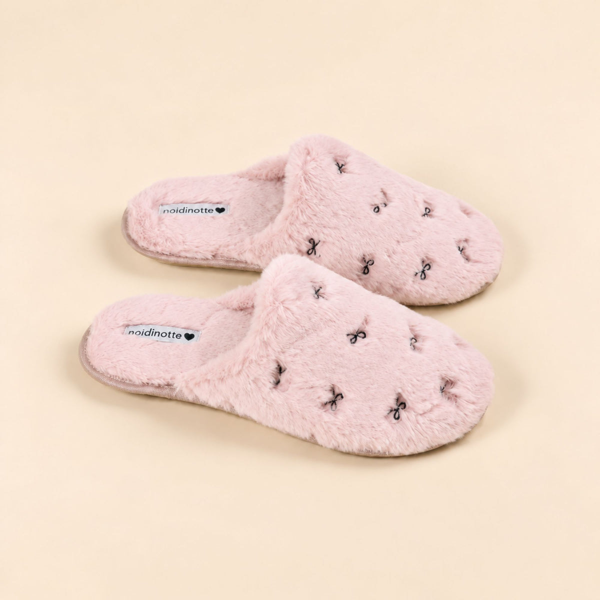 Pantofole in eco pelliccia con fiocchetti Noidinote PF3295