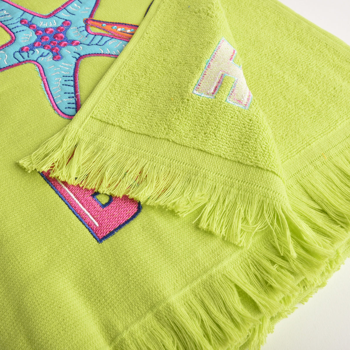 Telo mare Vingi spugna "Beach" verde lime con frange 100% cotone