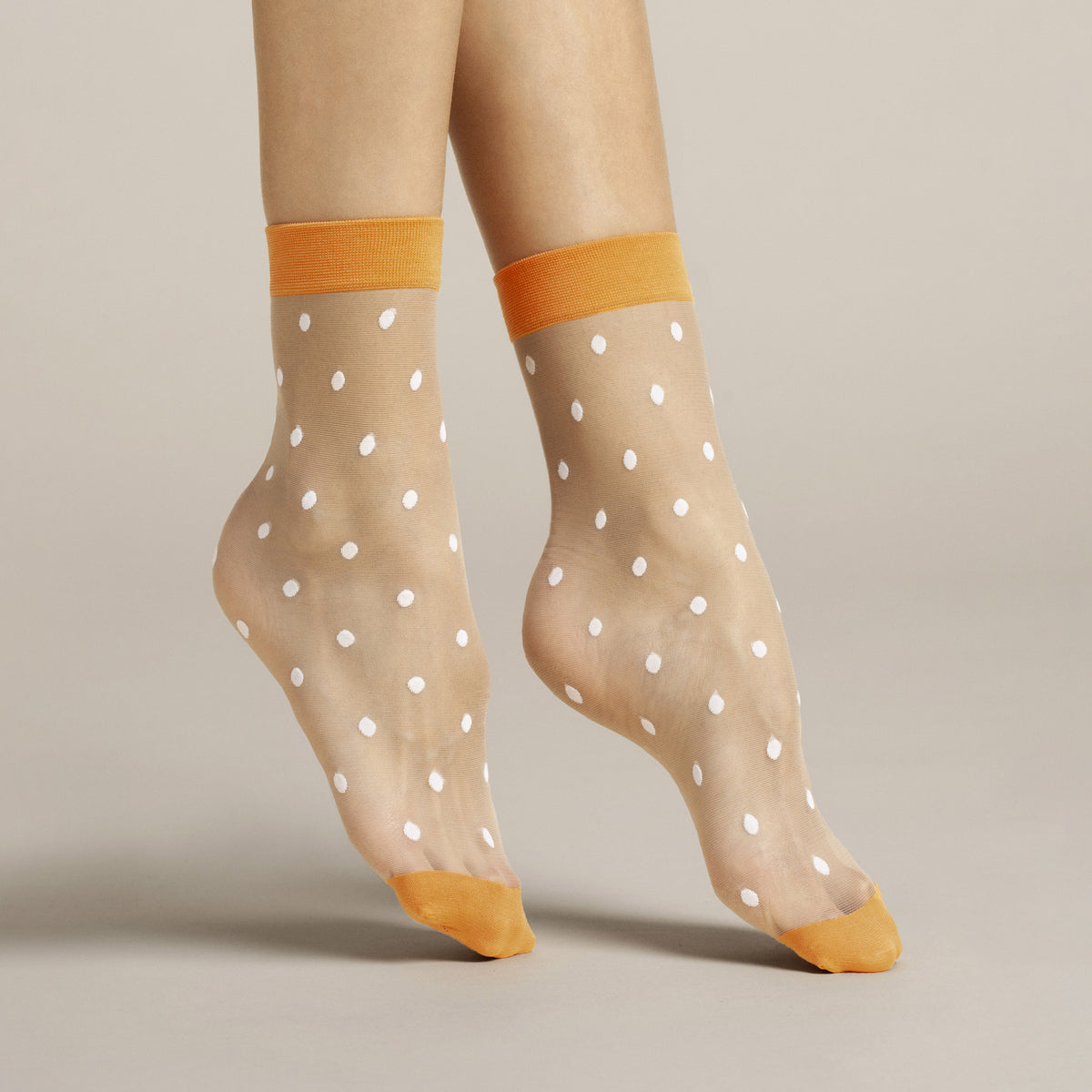 Calzino velato 20 den pois bianchi con polsino arancio Fiore Papavero