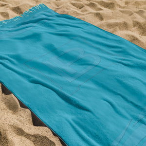 Telo mare Laura Biagiotti spugna jacquard "Shae" con frange 100% cotone